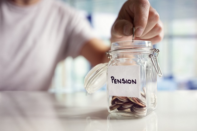 putting pennies in a jar