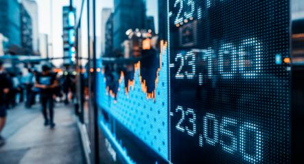 financial stock market sign with city light reflection