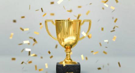 Image of trophy with confetti